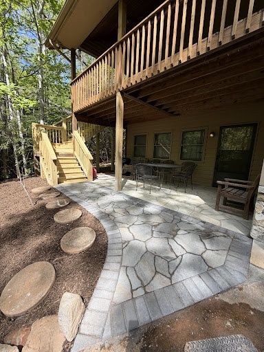 Enhance your outdoor space with our expert Deck Building service. Our skilled team specializes in durable and aesthetically pleasing designs, incorporating high-quality Concrete Masonry for lasting beauty and functionality tailored to your home. for JV Hardscape & Construction Inc in Hendersonville, NC