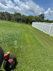 Our lawn care maintenance service ensures a lush, healthy yard by providing expert mowing, fertilizing, and weed control tailored to your landscape's specific needs for beautiful results year-round. for Cahoon's Coastal Lawn Care Services in Manteo, NC