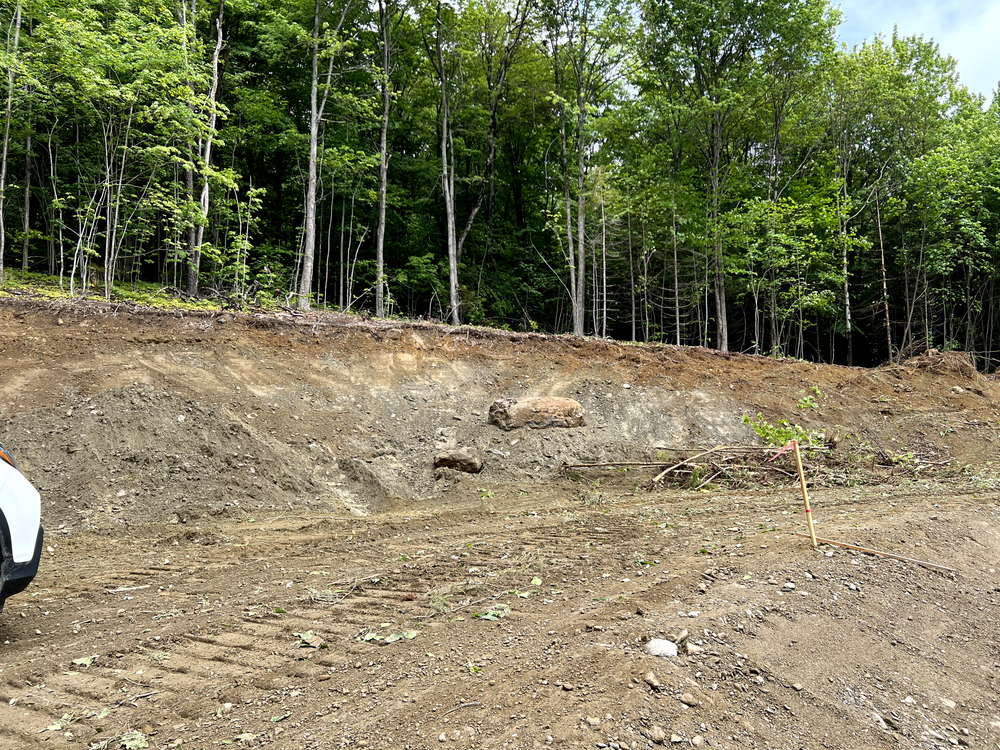 Carving a Pond into a Mountain Side for Andy Naylor Excavation in Stowe, VT