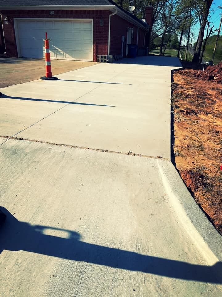 Our Concrete Patio Services provide homeowners with high-quality installations and repairs of durable, long-lasting concrete patios. Enhance your outdoor living space with our experienced team for functional and attractive results. for Divine Landscaping Services  in Stillwater, OK