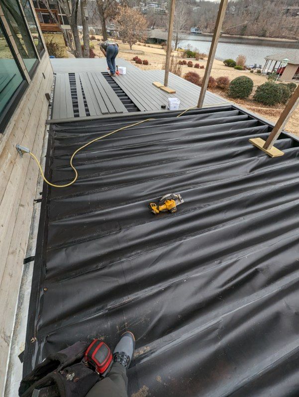 Our Under Deck Waterproofing service protects your deck from moisture, extending its lifespan and creating a dry, usable space beneath. Enjoy enhanced durability and additional outdoor storage or entertainment area. for NWA Custom Decks & Builds in Bentonville, AR