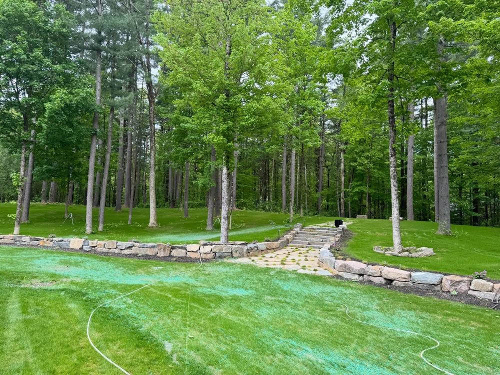 Transform your outdoor space with our expert Landscape Design service, offering innovative solutions that harmoniously blend aesthetics and functionality to enhance the beauty and value of your home. for The Lawn Guy in Saratoga Springs, NY