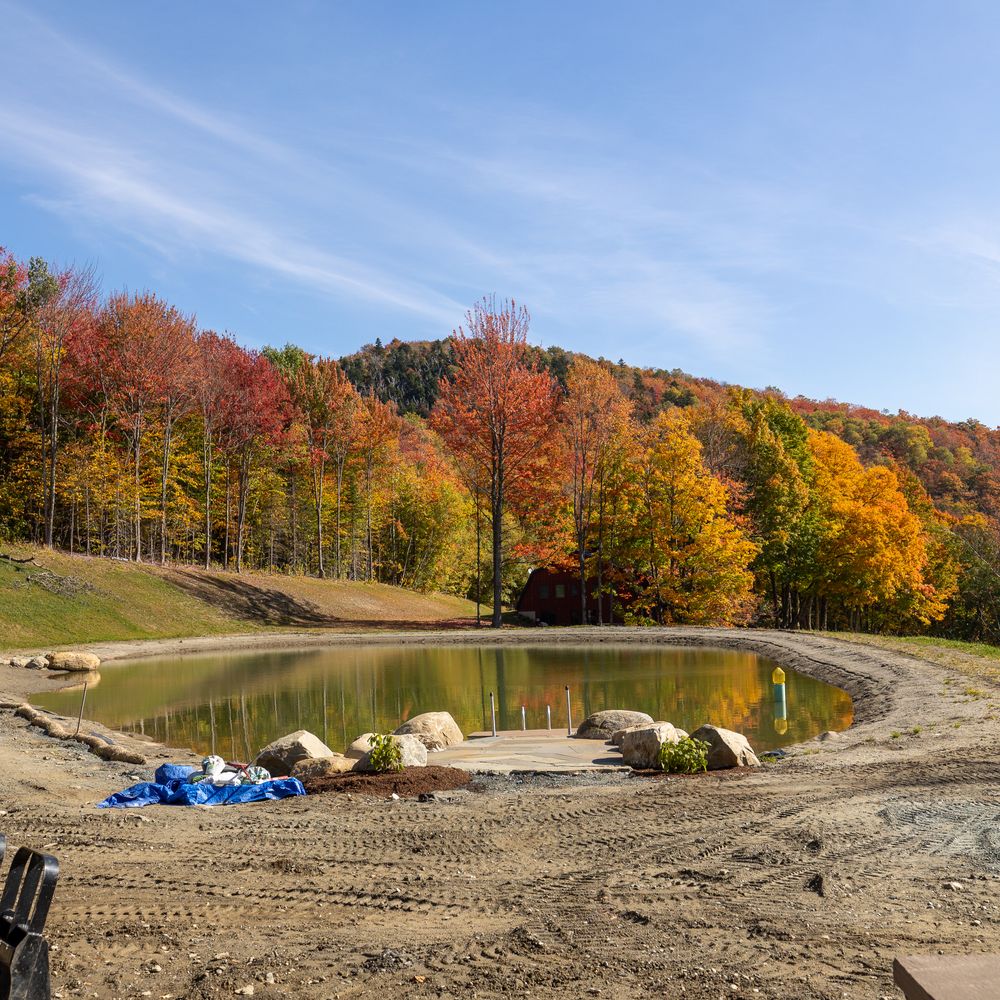 Carving a Pond into a Mountain Side for Andy Naylor Excavation in Stowe, VT