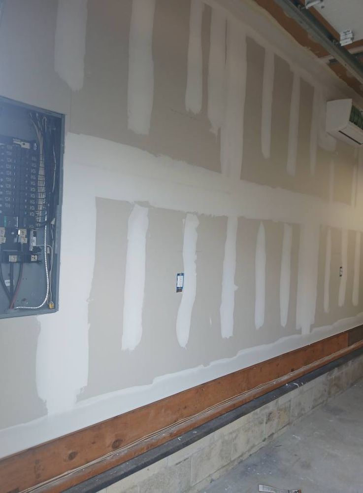 Enhance your home's interior with our professional drywall services, ensuring smooth surfaces and flawless finishes. Our skilled team delivers precision installation and repairs for a seamless look that elevates any space. for Top Tier Drywall and Painting LLC in Rosenhayn, NJ