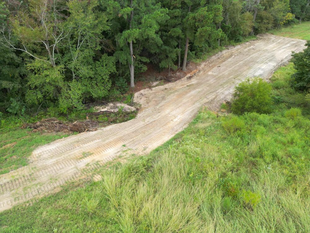 Our Driveway Construction service provides durable, high-quality driveways tailored to enhance your home's curb appeal. We prioritize precision and efficiency, ensuring seamless installation that withstands weather and heavy use for years. for CR Services in Rusk, TX