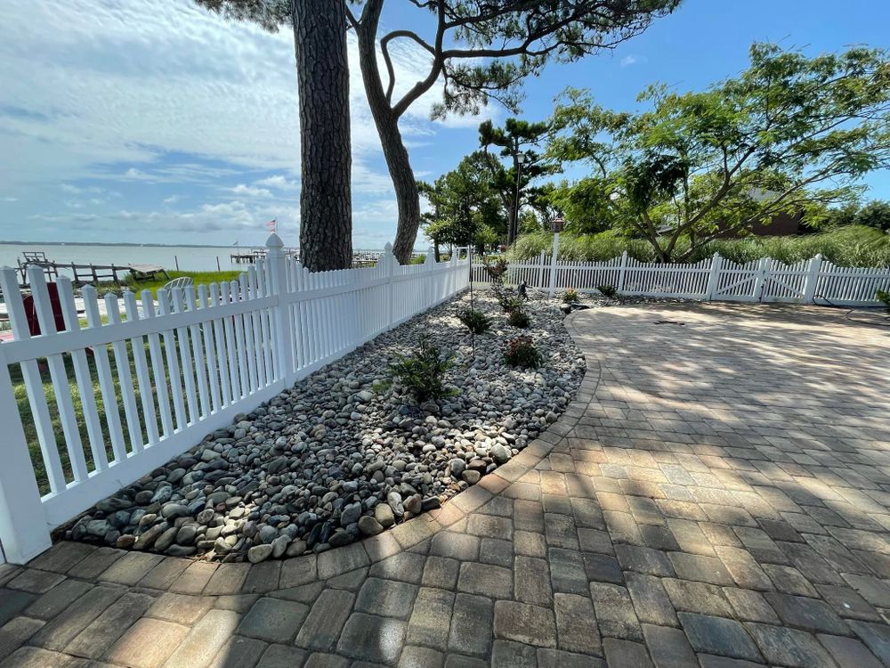 Transform your outdoor space with our expert Hardscape Installation service. We create stunning patios, walkways, and retaining walls that beautifully enhance your home's landscape while providing durability and functionality. for JND Transformation Landscapes & Hardscapes LLC in Cedar Point, NC