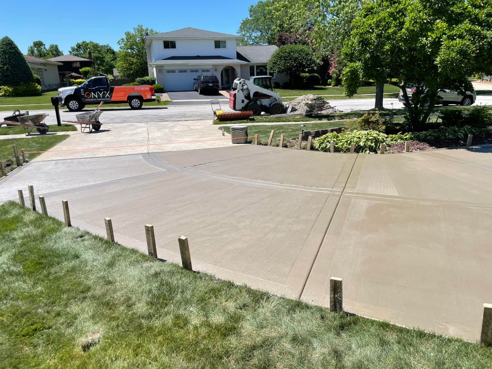 Our commercial concrete slabs service offers homeowners durable and long-lasting flooring solutions for their property. Trust our expertise in concrete services to enhance the value and functionality of your home. for Onyx Concrete Contractors in Chicago, IL