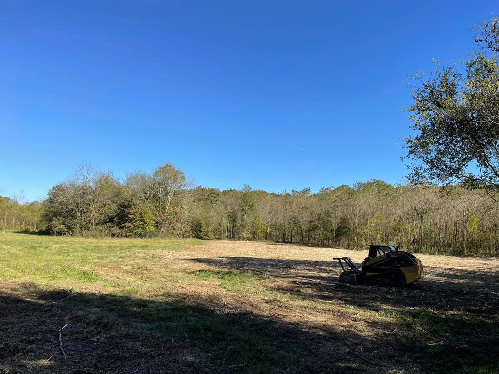 Our professional Forestry Mulching service efficiently clears overgrown areas on your property, providing a cleaner, more manicured appearance while ensuring safety and reducing fire hazards. Trust us for effective land maintenance. for Reed Construction Services LLC in Cartersville, GA