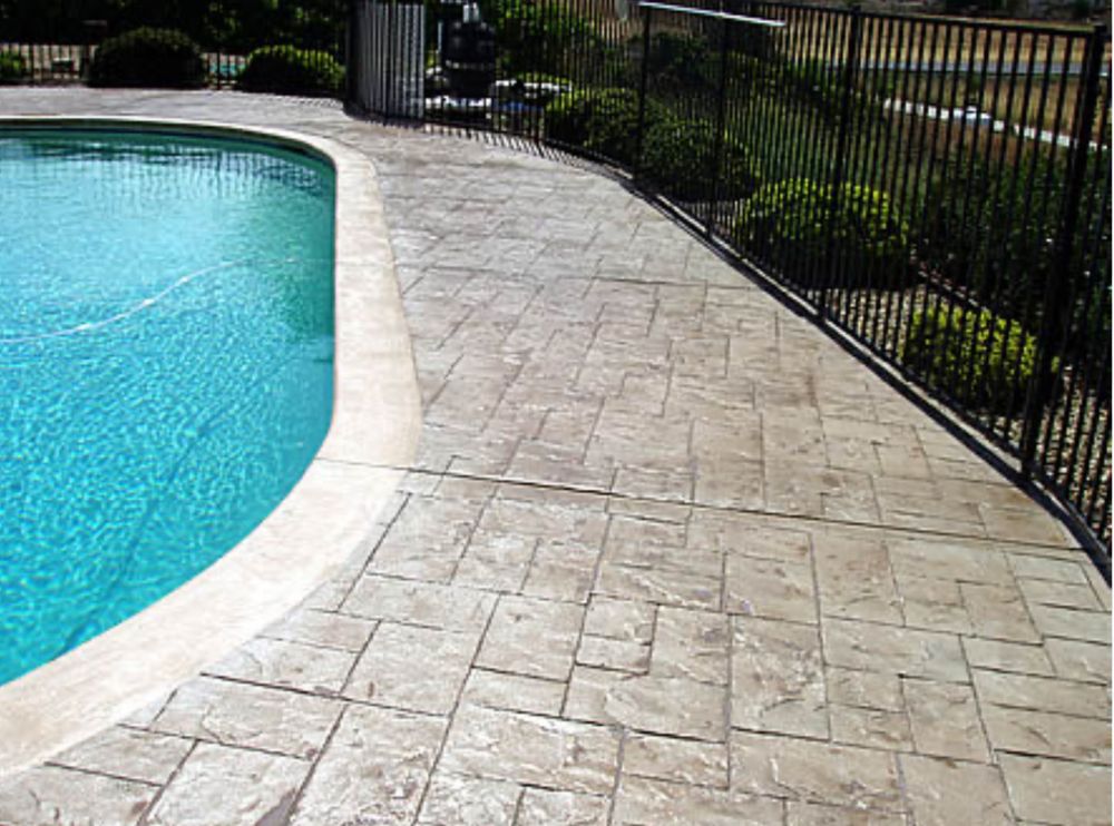 Discover what concrete stamping is with our service, transforming plain surfaces into beautiful designs. Enhance your home's curb appeal and value with durable, customized patterns that mimic stone or brick effortlessly. for Creative Remodeling & Plus in Lilburn, GA