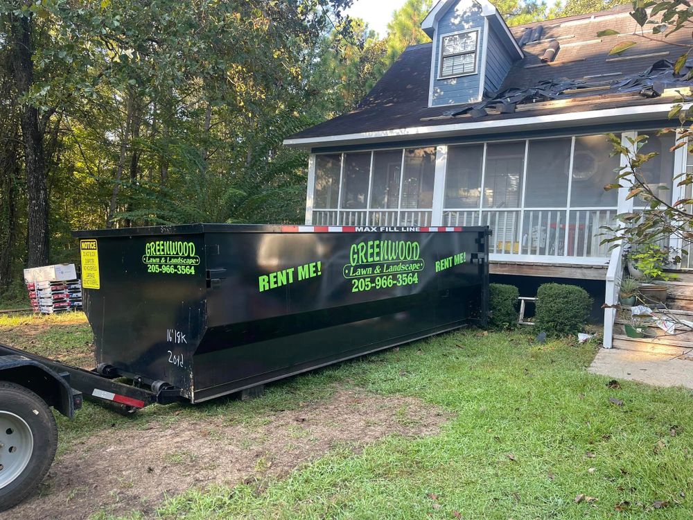 Our Roll Off Dumpster Rental service provides convenient and reliable waste disposal solutions for homeowners seeking efficient cleanup and removal of debris from their property. for Greenwood Lawn & Landscaping LLC in Talladega, Alabama