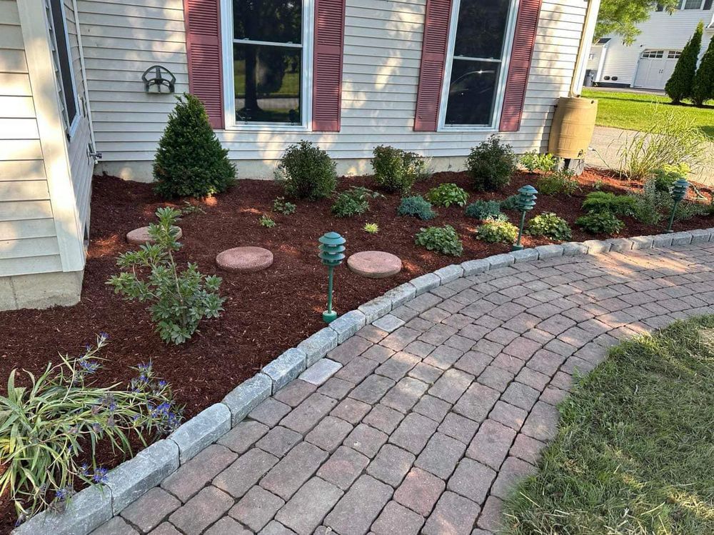 Our landscaping service designs, installs, and maintains beautiful outdoor spaces that enhance curb appeal, improve functionality, and reflect your style—creating a healthy, polished yard you’ll enjoy year-round. for Mow N Maintain Property Maintenance in Williston, VT