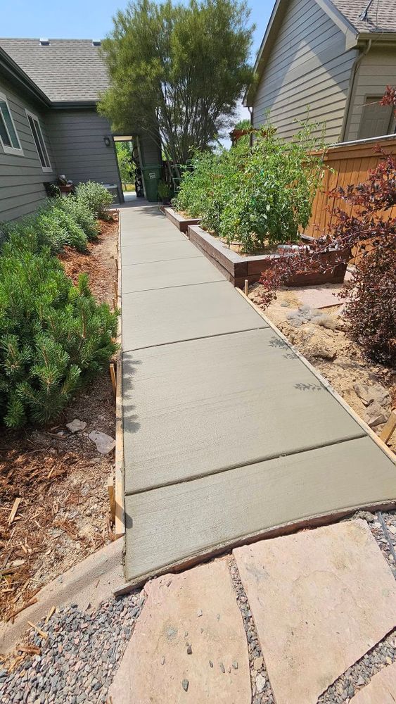 Our sidewalk installation services provide homeowners with durable and aesthetically pleasing walkways, expertly crafted to enhance safety and curb appeal. Trust our experienced team for precise, quality workmanship tailored to your needs. for Gemini Construction & Excavating LLC in Evans, CO