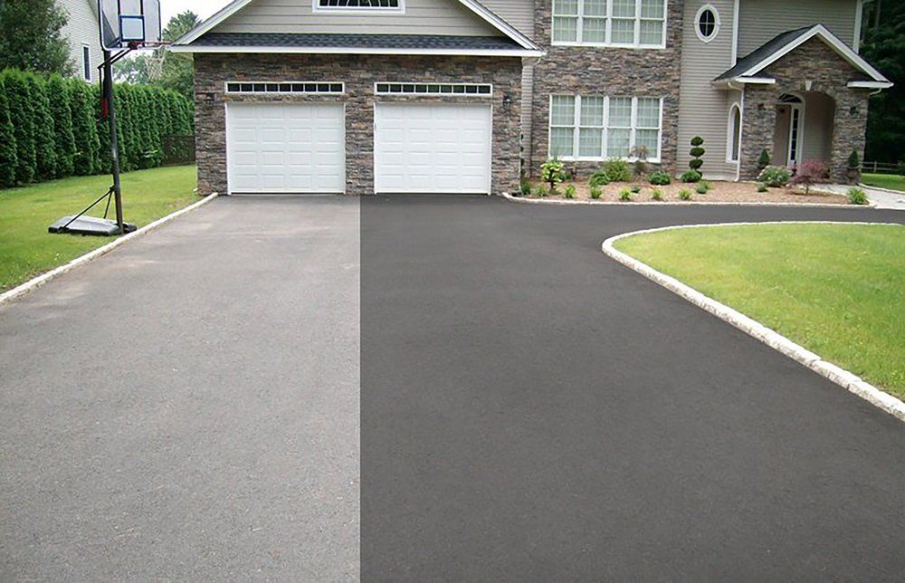 Our Residential Seal Coating service helps protect and beautify your driveway, extending its lifespan while enhancing the curb appeal of your home. Trust us to keep your property looking great. for Black Diamond Sealcoating in St. Charles, IL