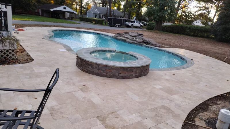 Our pool coping service includes expert installation of coping tiles to enhance the aesthetic appeal, safety, and durability of your pool edge. Contact us for a stylish upgrade today! for Matteo Hardscapes in Towson,  MD