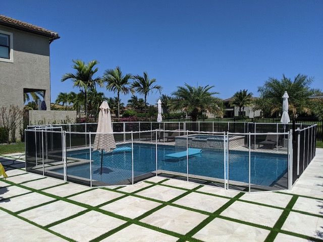 Pool Gates and Fences enhance safety, privacy, and style around your backyard oasis. Our expert team designs and installs durable, attractive solutions that complement your pool area perfectly. for MCN Pool Fence in Port St. Lucie, FL