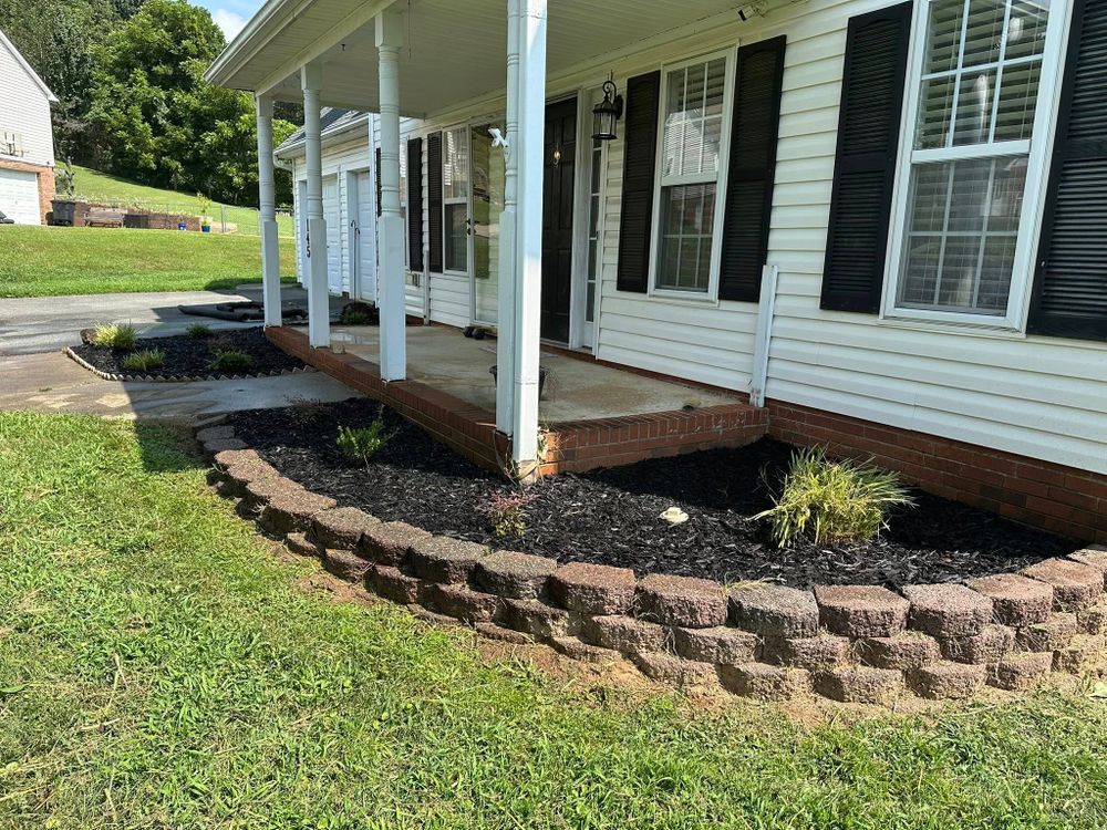 Enhance your outdoor space with our expert retaining wall construction, providing stability and aesthetic appeal to your landscape. Our durable solutions blend seamlessly into your design for added functionality and style. for Queen’s Landscaping in Kernersville, NC