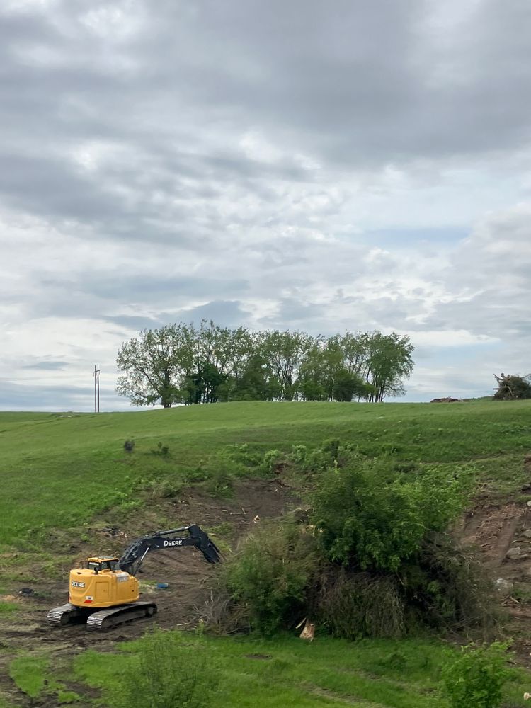 Our Land Clearing service efficiently removes unwanted vegetation, trees, and debris to prepare your property for construction or landscaping projects, ensuring a clean and safe environment for your future development. for Premier Services in New London, MN