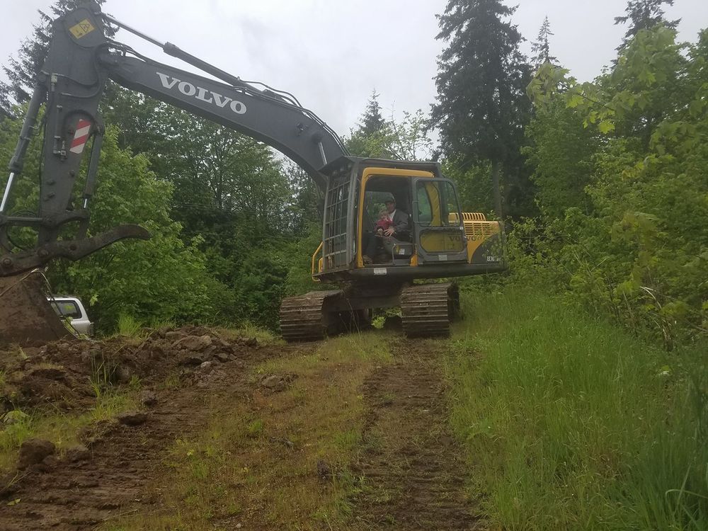 Our expert Land Clearing service efficiently removes trees and debris to prepare your property for construction or landscaping projects. Trust us for a clean slate and seamless project kickoff. for Buck & Sons Construction LLC in Woodland, WA