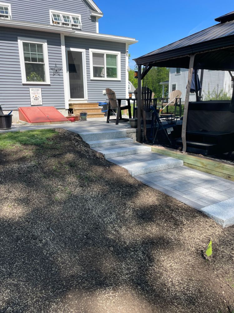 Enhance your home's entrance with our expert granite step construction services, offering durability and elegance for a timeless appeal. Trust our skilled team to create stunning steps that elevate your landscape. for Deering Ridge Landscaping in Waterboro, ME