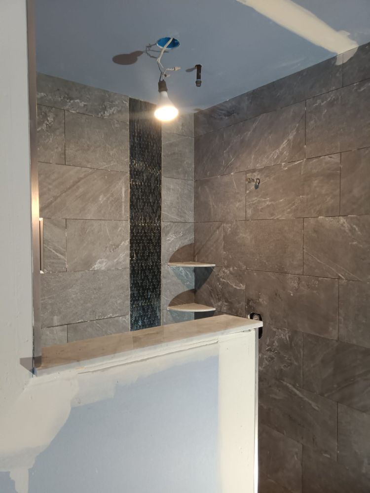 Upgrade your bathroom with our professional renovation service. From sleek new tiles to modern fixtures, we can transform your space into a beautiful and functional oasis. Contact us today! for I-69 Tile in St. Clair County, MI