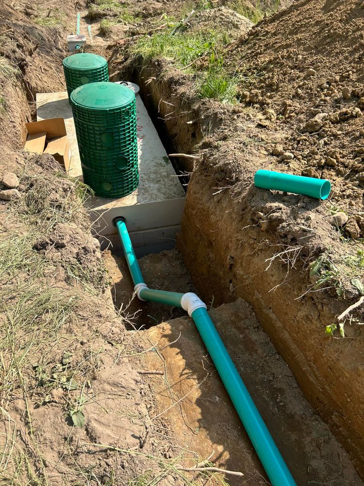 Our Sewer & Water Lines service ensures efficient installation, repair, and maintenance of essential underground utilities to safeguard your property's water supply and drainage systems for optimal functionality and longevity. for Mike Wilcoxson Excavating & Well Drilling in Pierceton,  IN