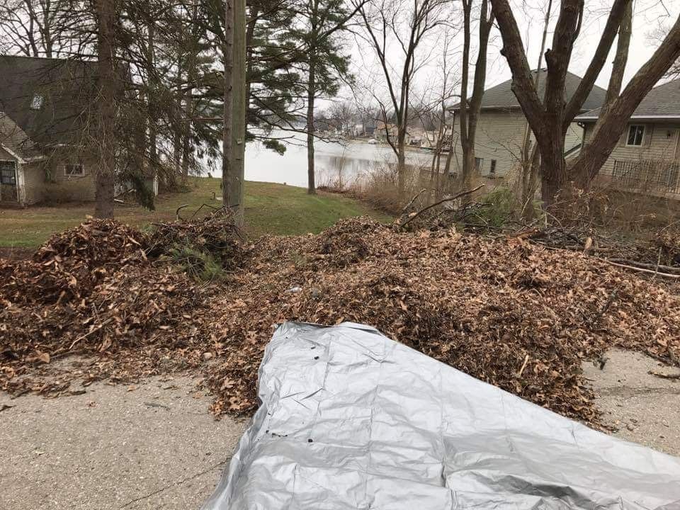 Our Fall Clean Up service helps homeowners prepare their lawn for colder months by removing leaves, debris, and branches. Keep your yard healthy and beautiful with our thorough autumn maintenance package. for Down To Business LLC in Howell, Michigan