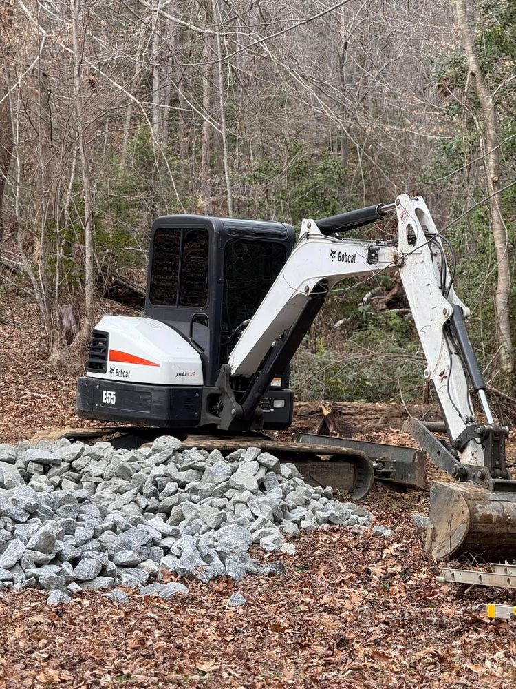 Our Debris Removal service efficiently clears construction and yard waste, ensuring your property remains clean and safe. Trust our team to handle all debris management needs quickly and professionally. for OCD Landworks in Lenoir, NC