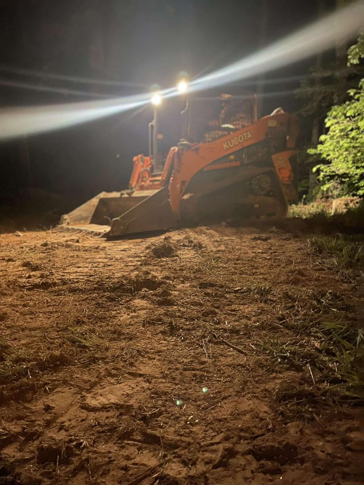 Our grading service expertly levels and prepares your property's terrain, ensuring proper drainage and foundation stability for construction or landscaping projects, enhancing safety, longevity, and aesthetic appeal of your home’s landscape. for Cline's Land Management in Dalton, GA