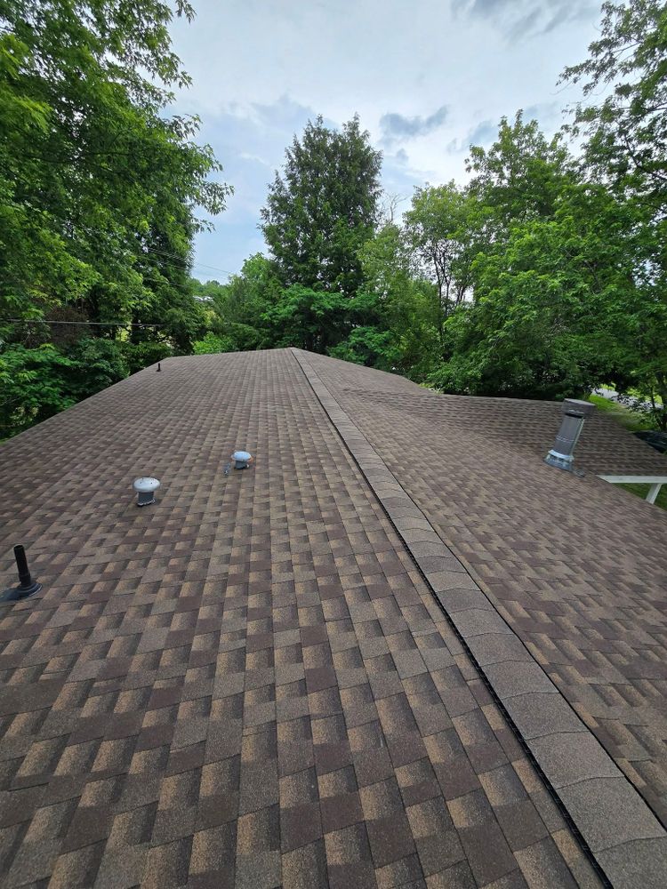 Our Roofing Installation service ensures durable and reliable coverage for your home, complementing our comprehensive new construction projects, including deck & patio installation, to enhance both function and aesthetic appeal. for Shelton’s Construction in London, KY