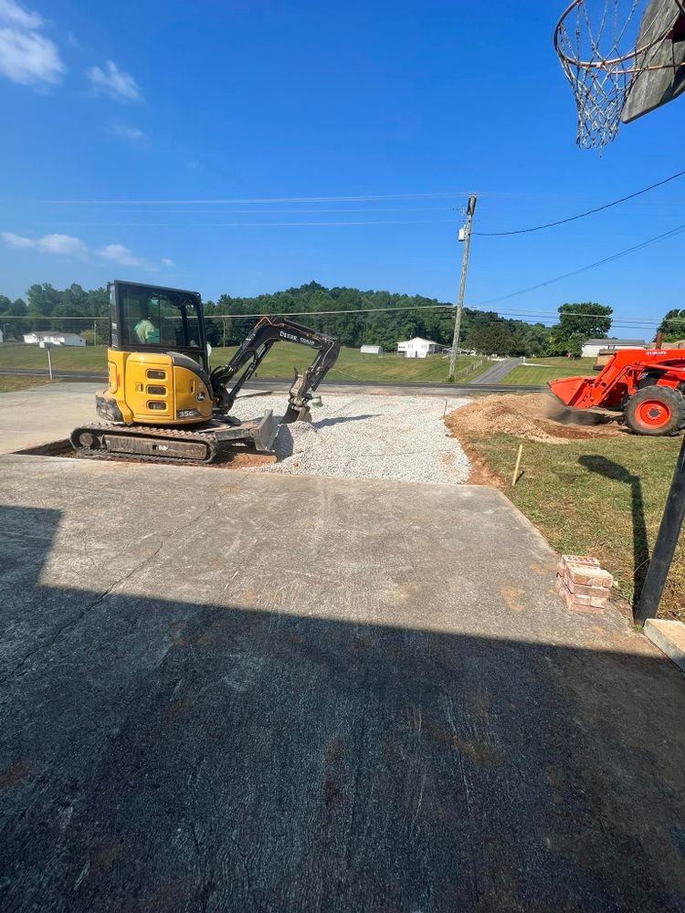 Our Skid Steer Work service offers efficient and versatile equipment for various tasks such as grading, trenching, and debris removal to help homeowners with their landscaping or construction needs. for KTN Excavation in Clinton, TN