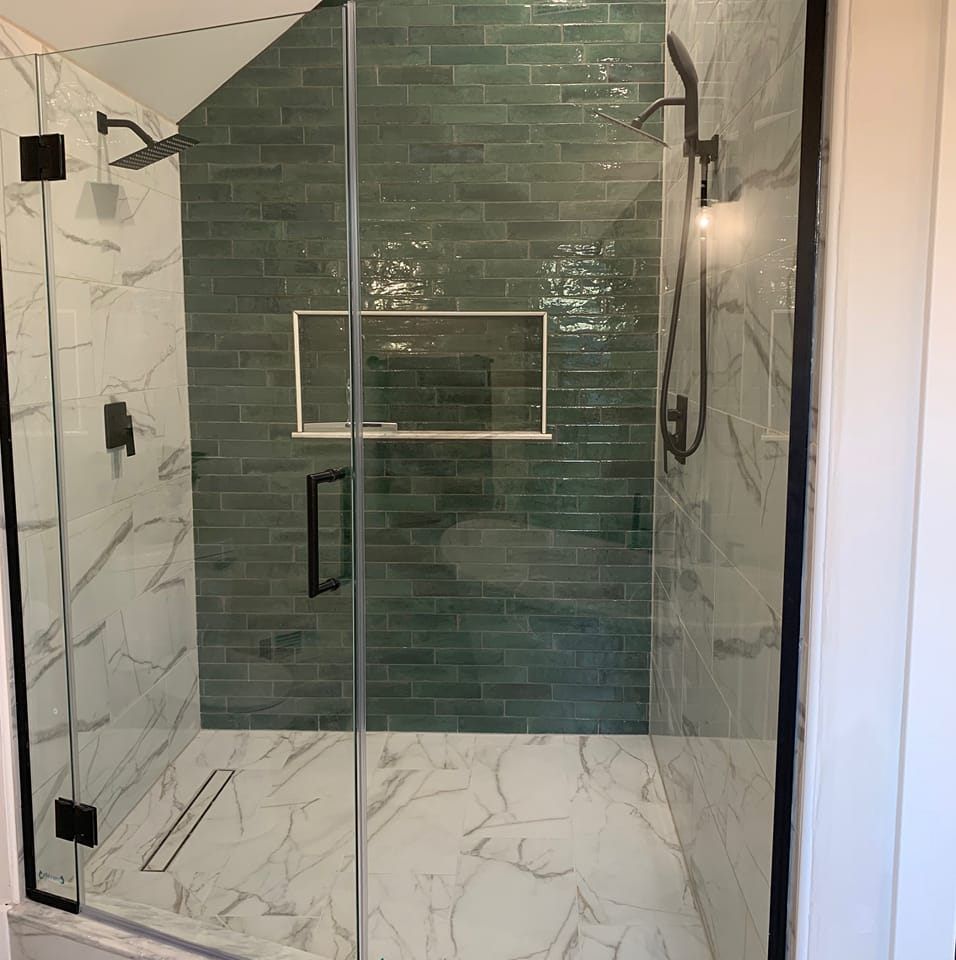 Transform your bathroom with our Custom Showers service. Choose from a variety of styles, materials, and finishes to create a unique and luxurious shower experience tailored to your preferences and needs. for New Millennium Construction Services Corp  in Wilmington, IL