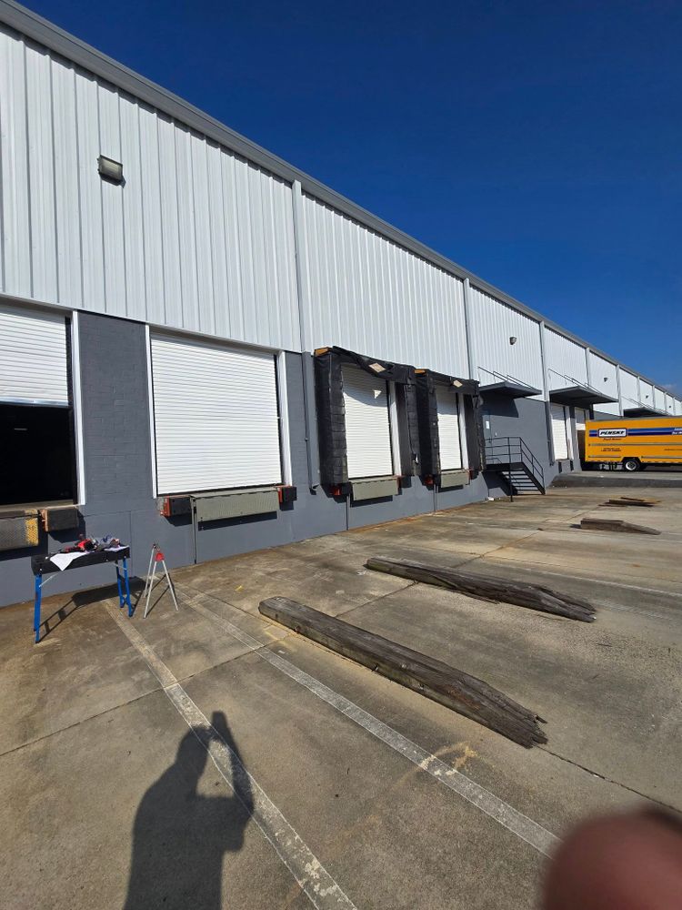 Our Dock Repair & Maintenance service ensures your garage doors function seamlessly by specializing in motor repair, delivering hassle-free performance and reliability for homeowners who need efficient and timely solutions. for Southern Door&Dock Equipment Specialists in Kings Mountain, NC
