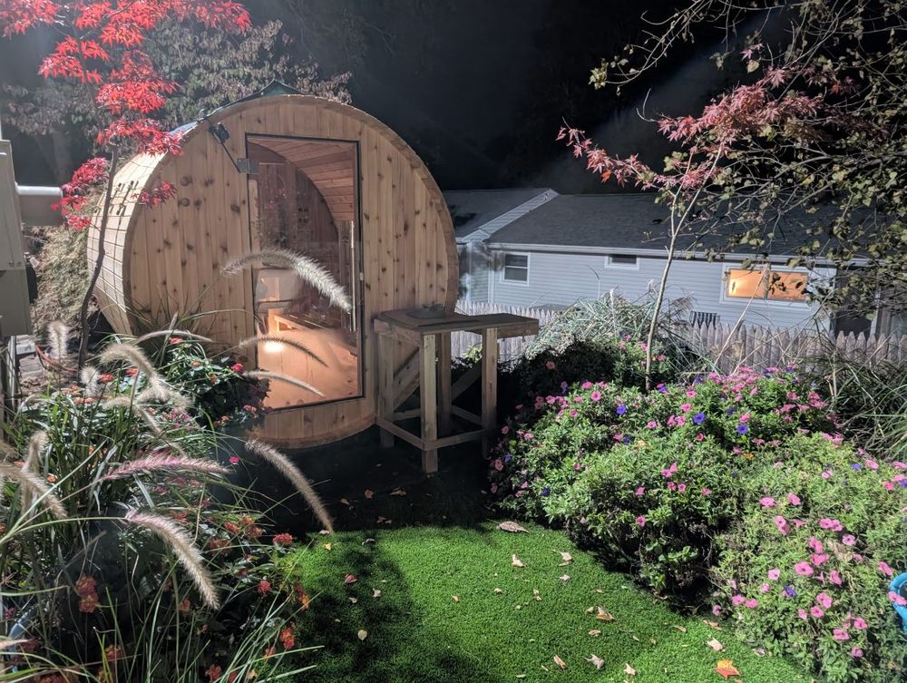 Enhance your outdoor space with our professional sauna installation services. Our experts seamlessly integrate saunas into your landscape design while offering mulch installation to complement and beautify the entire area. for Evolution Earthscapes, LLC in Ludlow, MA