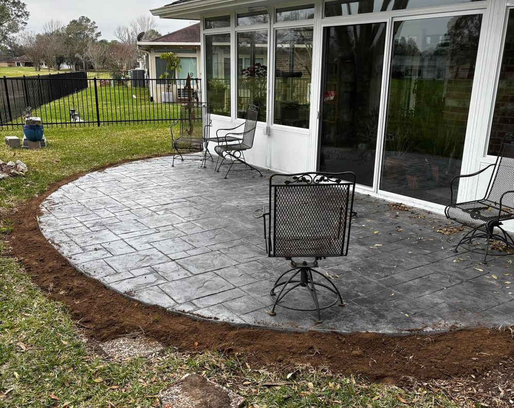 Enhance your home's aesthetic with our Stamped Concrete Installation service, providing durable and visually appealing designs that mimic stone or brick. Enjoy customized patterns and colors to beautifully transform any outdoor space. for Rytren Concrete in Pearland, TX