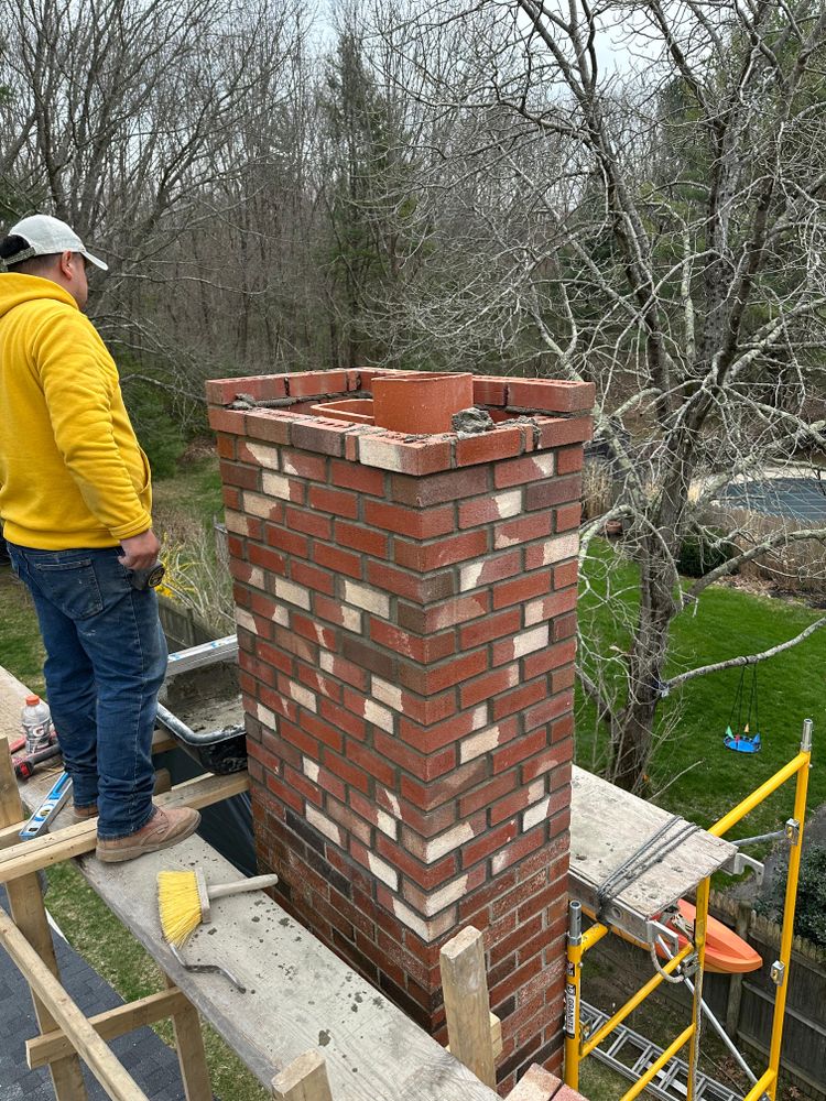 Chimney photos from restoration to new builds for All For U Roofing & Masonry in Boston, MA