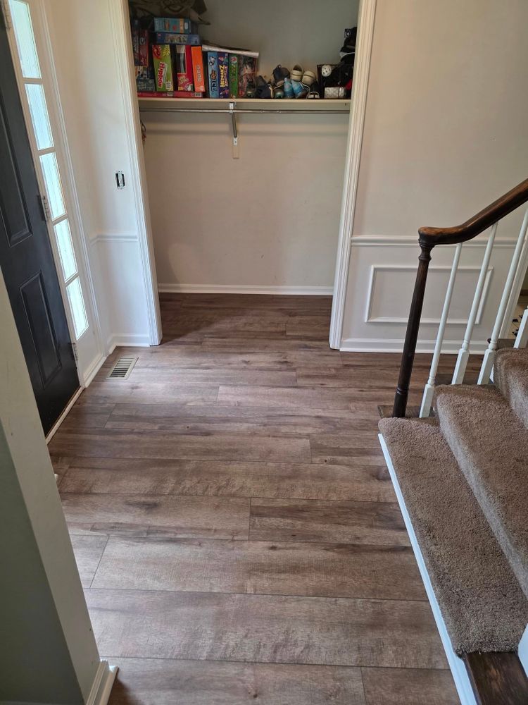 Our flooring installation service provides homeowners with expert craftsmanship and a wide selection of quality materials to transform your living spaces, ensuring durable and beautiful floors that enhance your home's value. for Erie Coast Custom Construction in Norwalk, OH