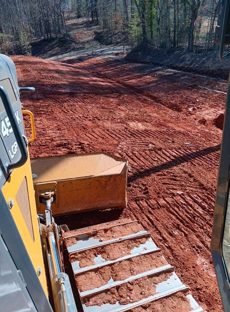Our Land Grading service ensures a level, stable foundation for your projects, enhancing drainage efficiency and preparing your property expertly while minimizing erosion risk for beautiful and sustainable outdoor spaces. for Baldwin Grading of NC in Pilot Mountain, NC