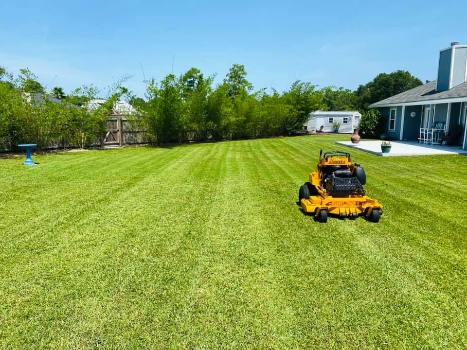 Our mowing service provides homeowners with a neatly trimmed lawn every week. We also offer mulching and edging services to give your yard a well-maintained look. for <s>Lawns By St. John</s> in North East, Florida