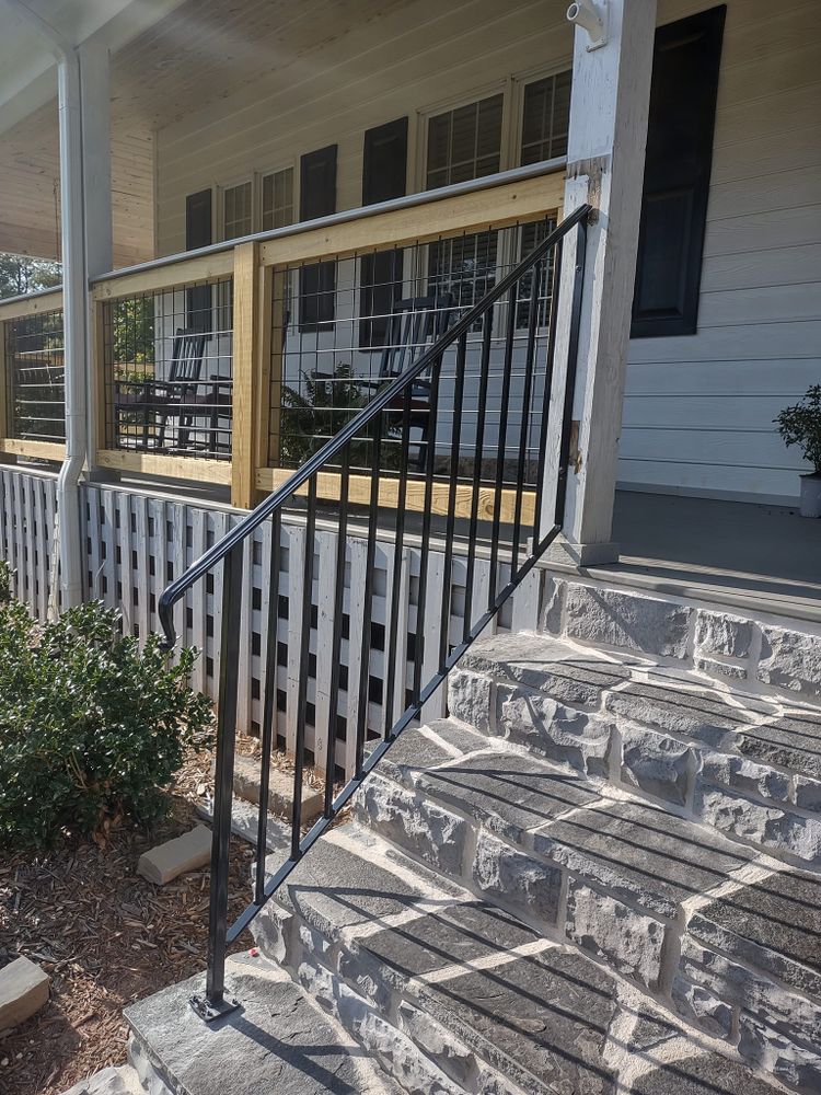 Enhance your home's safety and style with our custom handrails. Our expert welding services ensure durable, elegant designs tailored to fit seamlessly into any staircase or balcony for added security. for Moose Welding And Metalworks in Blue Ridge, GA