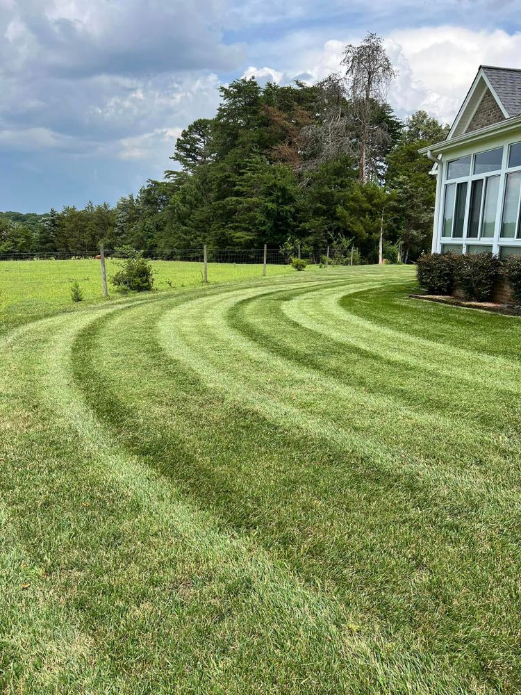 Elevate your outdoor space with our natural stone hardscape service, creating beautiful and durable pathways, walls, and features that enhance the overall aesthetic and functionality of your landscaping design. for Red Clay Landscapers in Sophia, NC