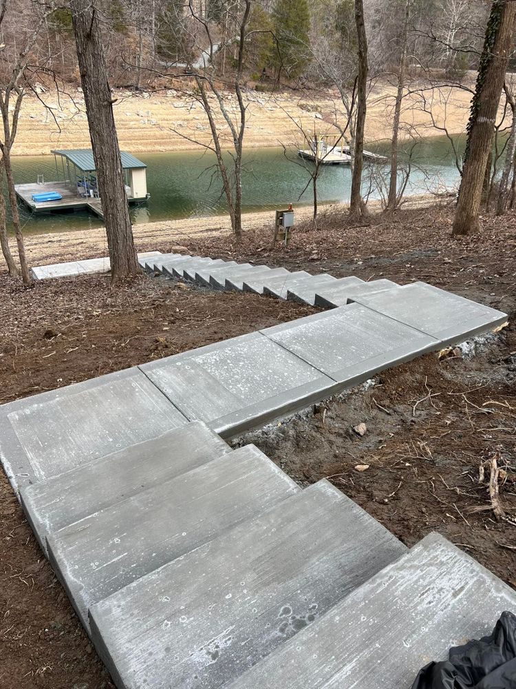 Transform your home with our expert Stair Design & Installation service. Our team crafts durable, stylish concrete stairs tailored to your space, ensuring safety and enhancing aesthetic appeal. for Rocky Top Concrete & Excavating in Knoxville, TN