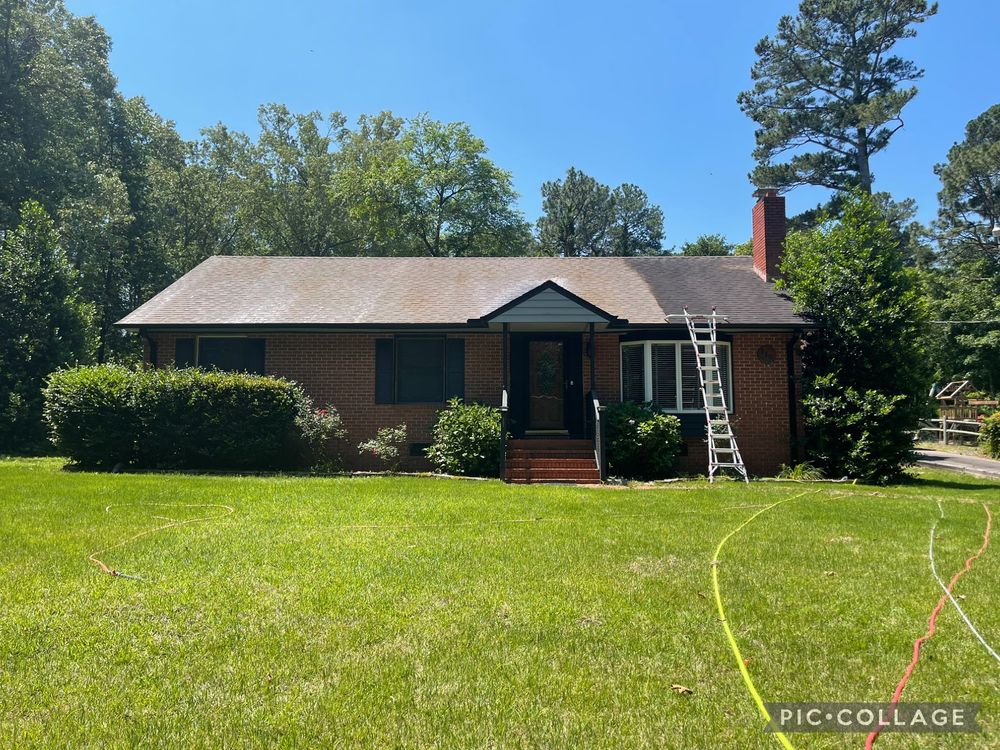 Our roof cleaning service safely removes dirt, algae, and moss using gentle soft washing techniques, enhancing your home's appearance while protecting roofing materials from damage caused by traditional pressure washing methods. for Hydro Wash Exteriors LLC in Fayetteville, NC