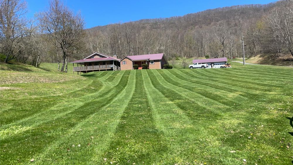Transform your lawn with our expert mowing service, ensuring a precise cut every time. Enjoy a well-manicured, lush landscape that enhances your home's curb appeal while saving you time and effort. for Simmons Brothers Investments in Pounding Mill, VA