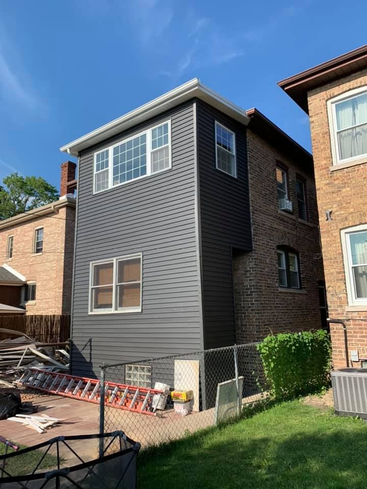 Enhance your home's curb appeal with our expert vinyl siding house services, offering durable materials and professional installation to ensure a stunning, weather-resistant exterior that elevates your property's value. for S & L Innova General Construction in Burbank, IL