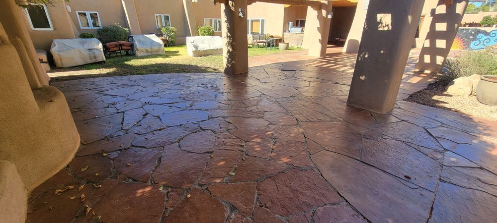 Enhance your home's curb appeal with our professional stamped concrete installation, offering a durable and stylish solution that mimics the look of natural stone or brick at a fraction of the cost. for Not Just Concrete in Albuquerque, NM