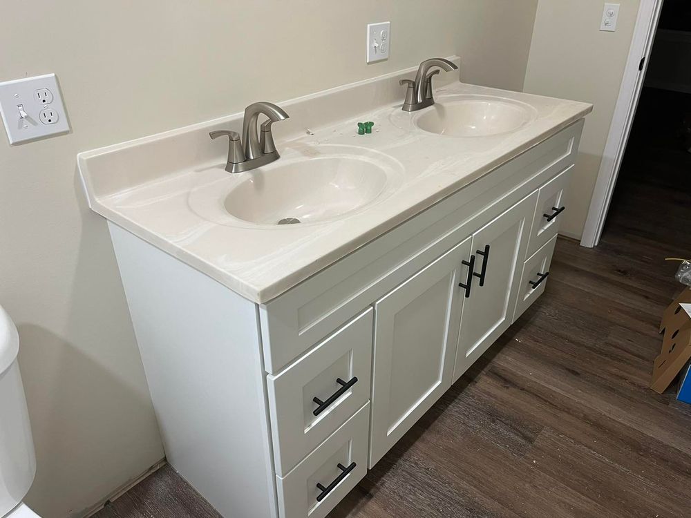 We offer custom-designed bathroom cabinets that are both functional and stylish, providing homeowners with the perfect storage solution to enhance their bathroom decor and organization. for Carty Carpentry in Cookeville, TN