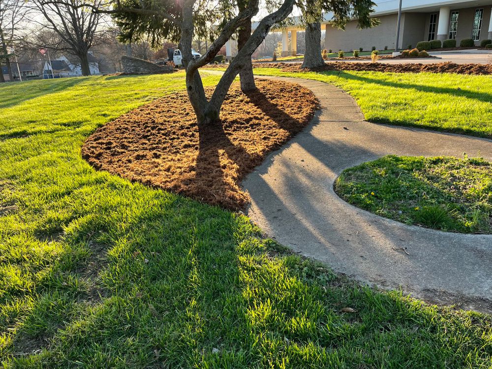 Our Mulch Installation service provides homeowners with a hassle-free and professional solution for enhancing the aesthetics and health of their landscape beds by adding a protective layer of mulch. for Lamb's Lawn Service & Landscaping in Floyds Knobs, IN