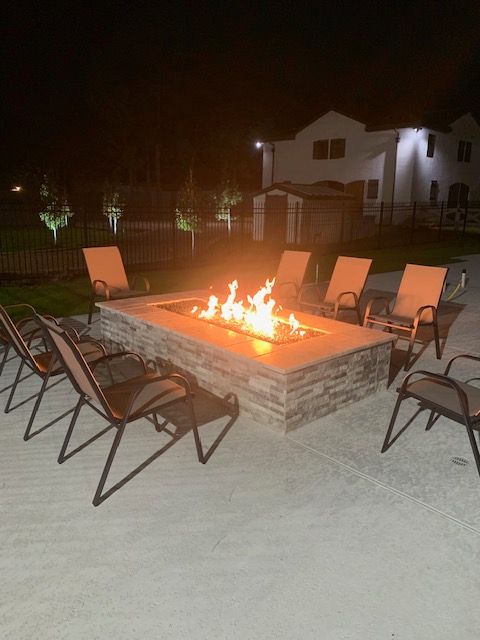 Enhance your outdoor space with our custom firepits, expertly designed to complement your pool area. Enjoy cozy evenings and elevate ambiance with durable, aesthetically pleasing designs tailored to your home. for Out Back Pool and Spa Creations in The Woodlands, TX