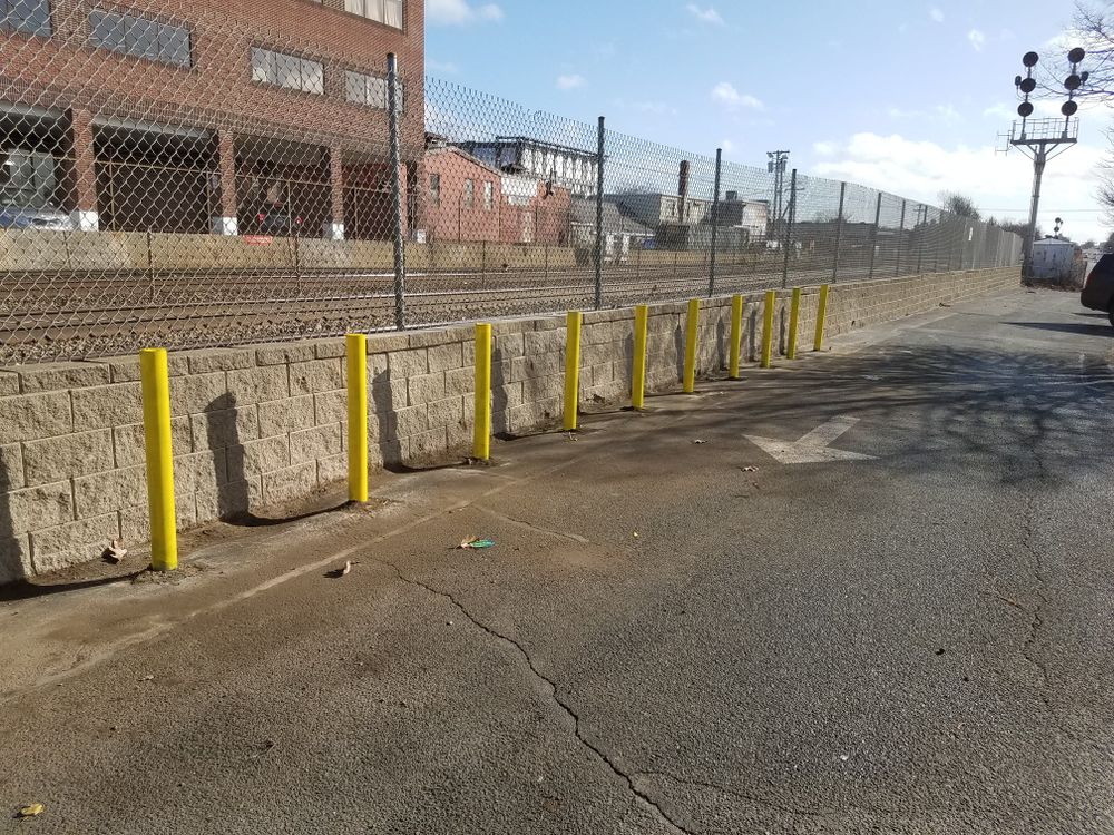 Our expert Retaining Wall Construction service provides durable, attractive solutions to prevent soil erosion and enhance your landscape's beauty, ensuring stability and aesthetic appeal for your home's outdoor spaces. for Graziano Empire in Billerica, MA