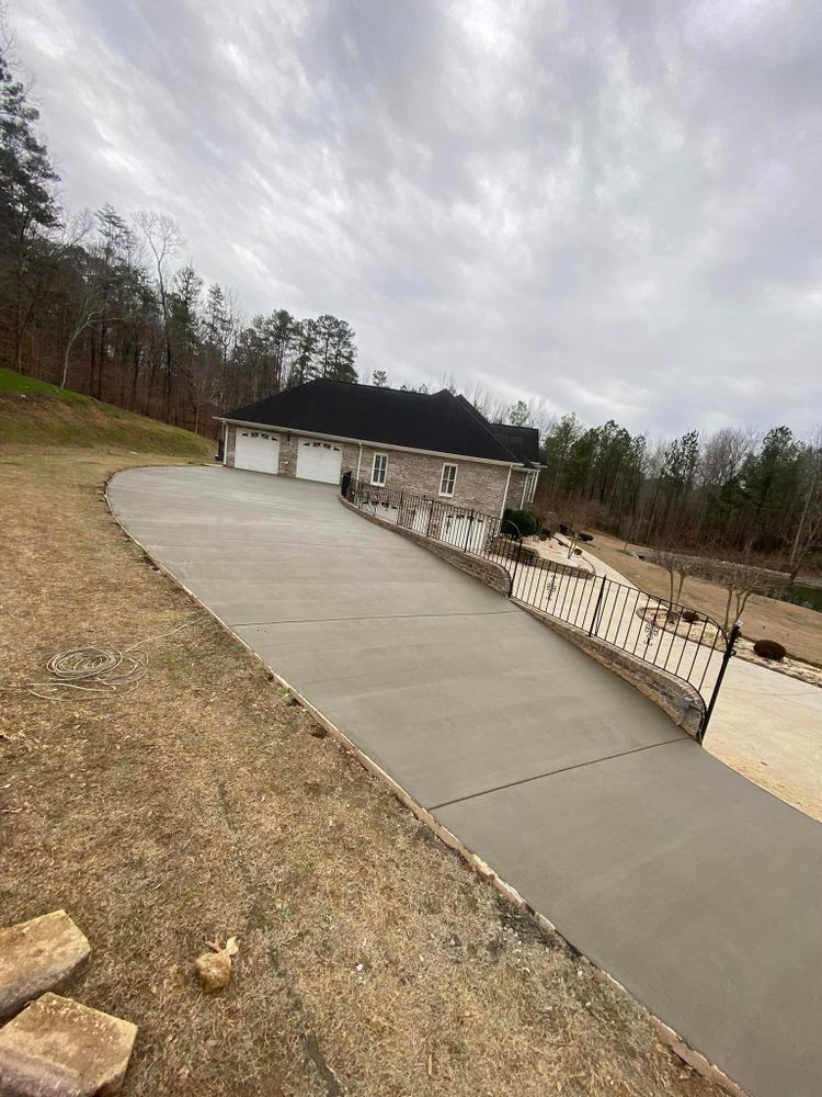 Transform your outdoor space with our professional concrete services. From driveways and walkways to patios and pool decks, we provide expert craftsmanship for durable and stylish solutions that enhance your home. for Stillwell Earthworks in Trussville, AL